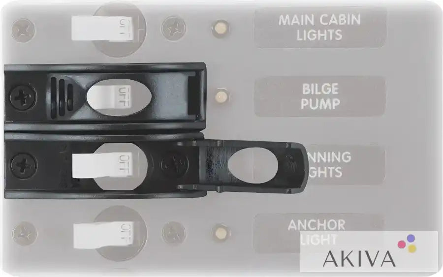 Black electrical switch panel with toggle guard from Blue Sea Systems circuit breakers
