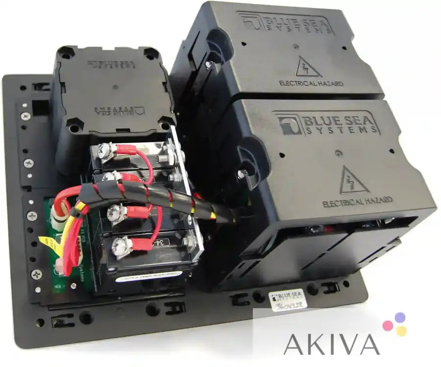 Black electrical distribution panel with Blue Sea Systems BSS Panel 360 Rear AC Cover