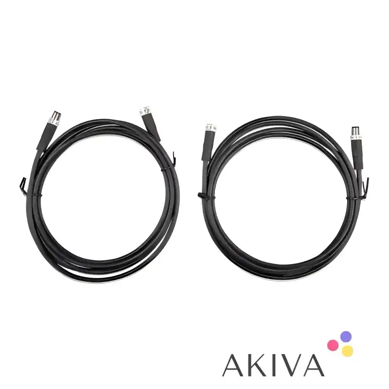 Two coiled black M8 circular connector male/female 3 pole cables with metal connectors