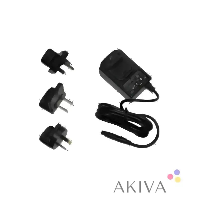 Black power supply unit with interchangeable plugs for versatile power supply solutions
