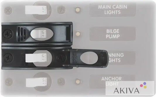 Black electrical switch panel with toggle guard from Blue Sea Systems circuit breakers