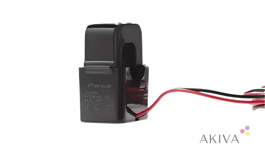 Black current transformer with attached wires for Fronius Current Transformer For Smart Meters