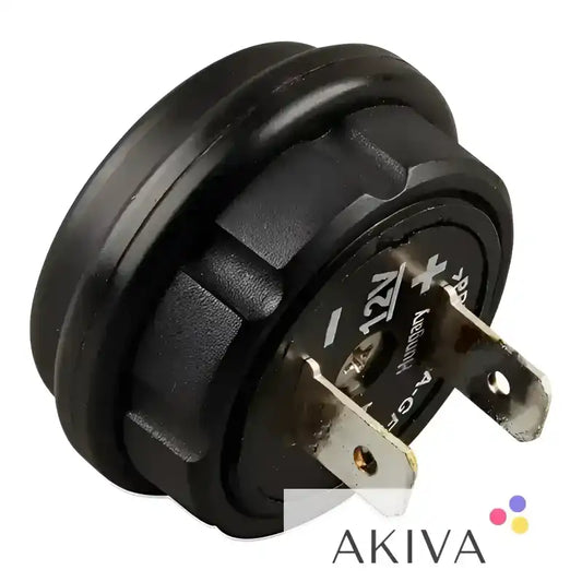 Black round MagCode Power Port 12V electrical component with metal prongs