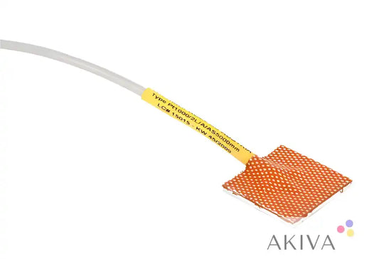 Square orange module temperature sensor with attached cable for precise temperature measurement