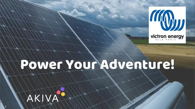 victron energy solar panels mounted on a van roof in the countryside